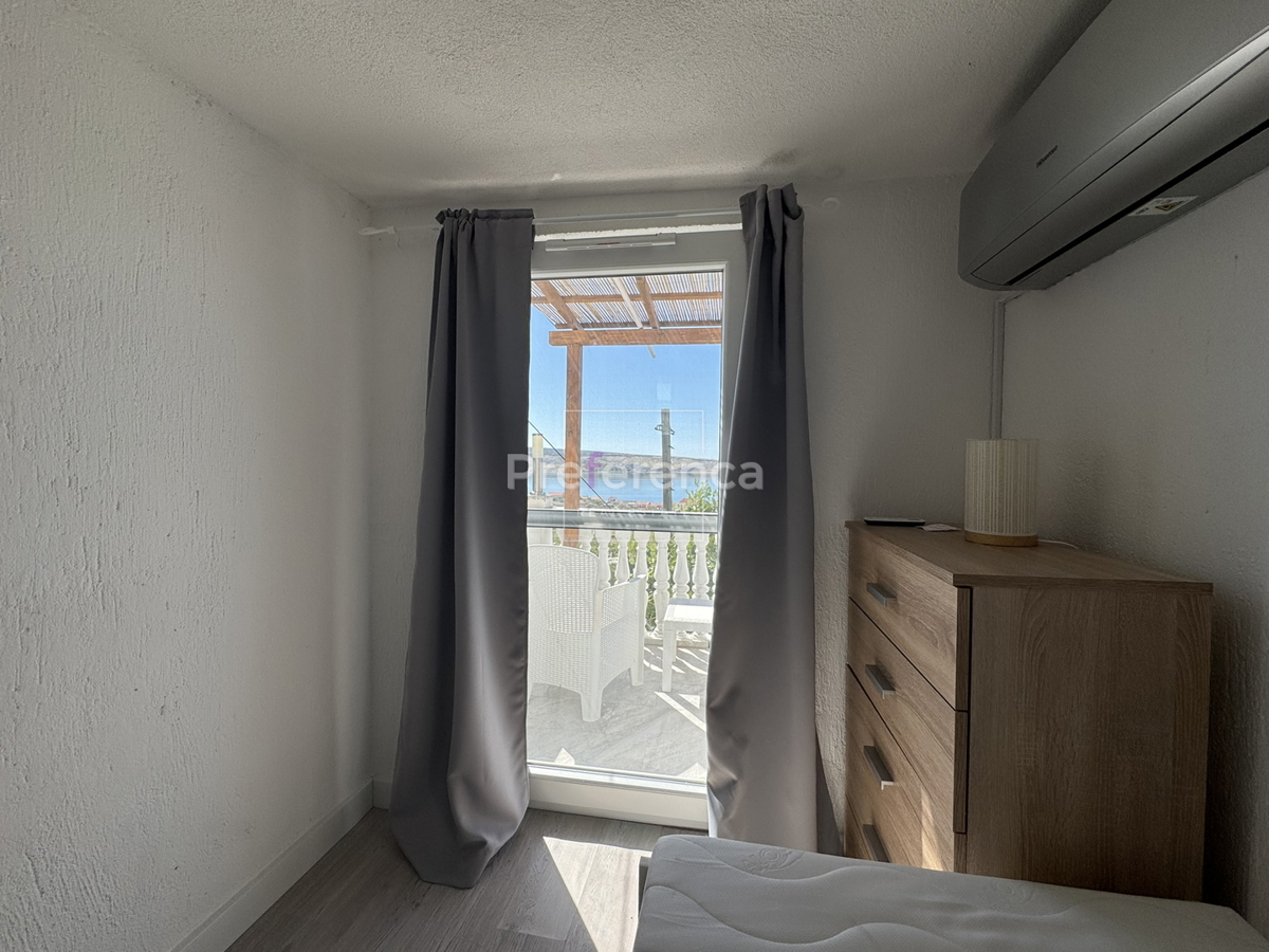 Kustići - vrstna hiša s 4 enotami