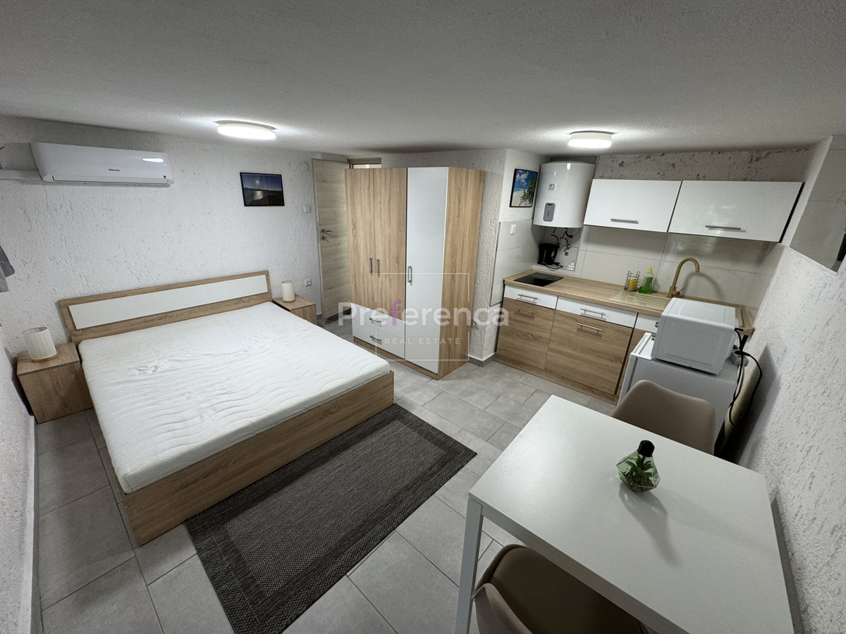 Kustići - vrstna hiša s 4 enotami