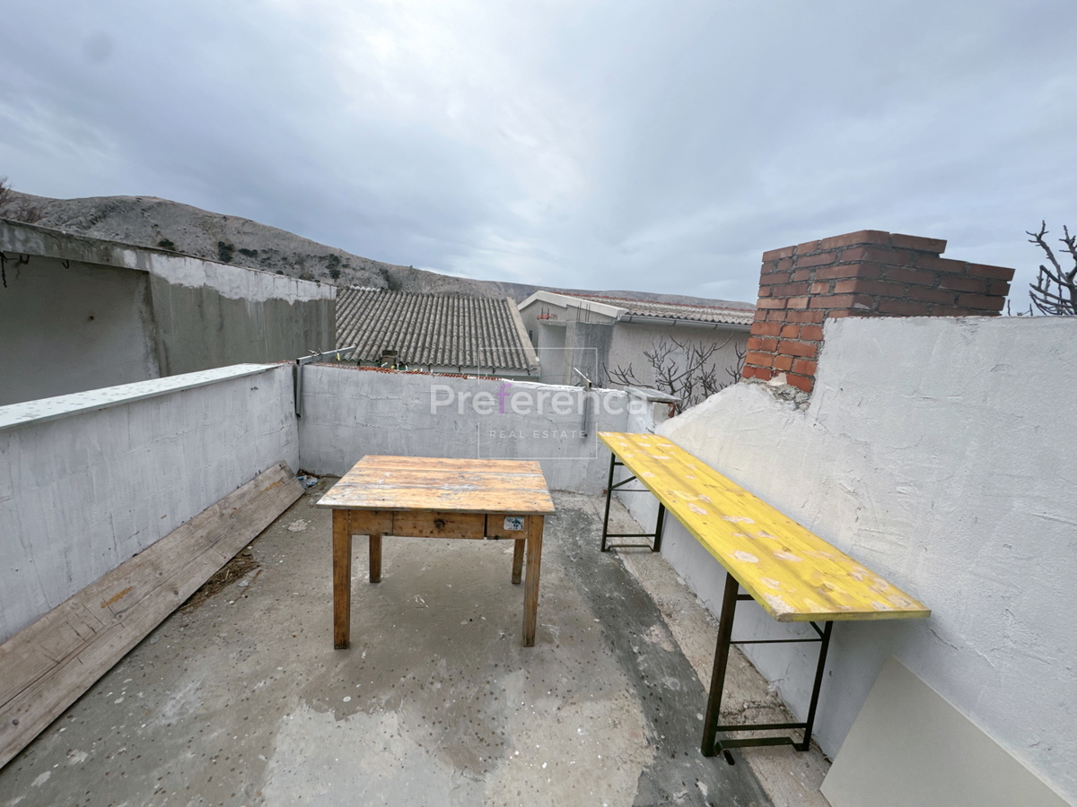 Metajna - pritlična hiša v starem jedru