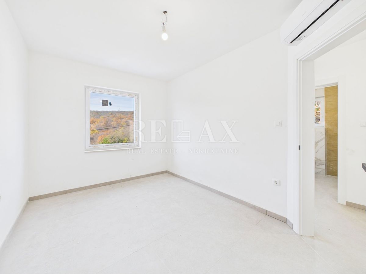 Povile - dvosobno stanovanje s pogledom na morje,novogradnja