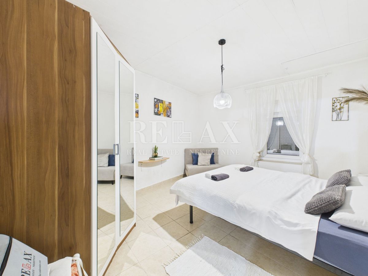 Kastav - hiša s 3 stanovanji in poslovnim prostorom