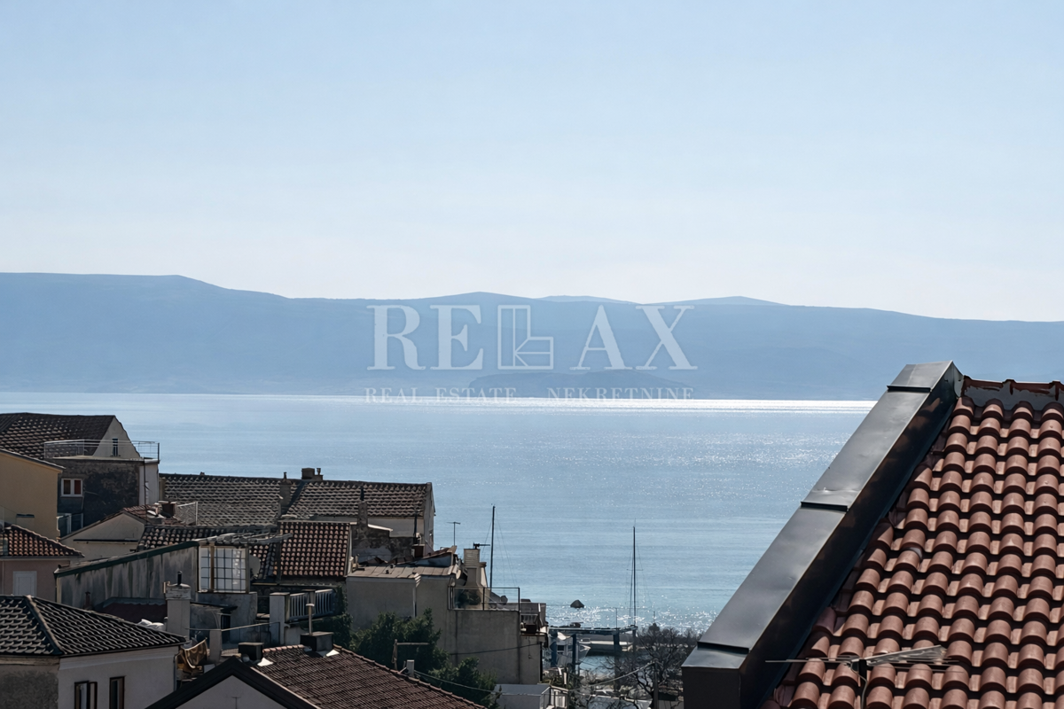 Novi Vinodolski - dve hiši v središču mesta