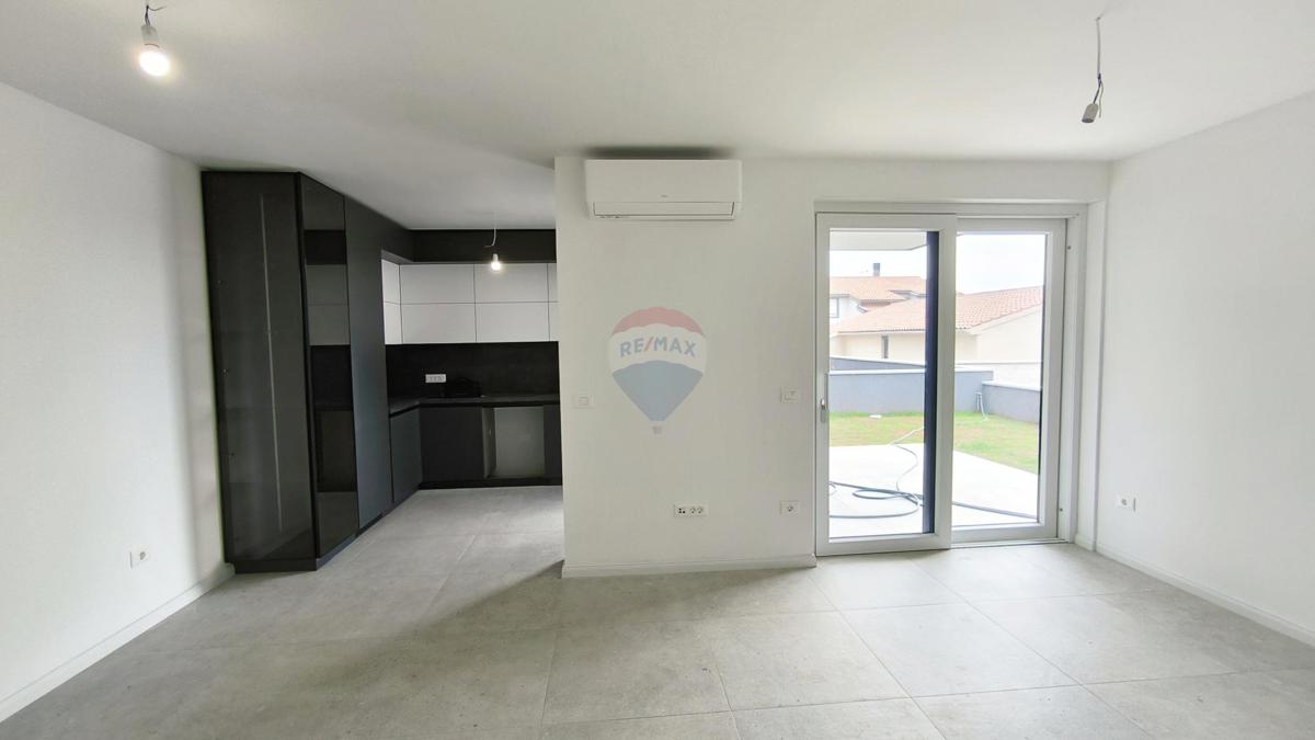 Istra, Valbandon – dvosobno stanovanje z vrtom, novogradnja