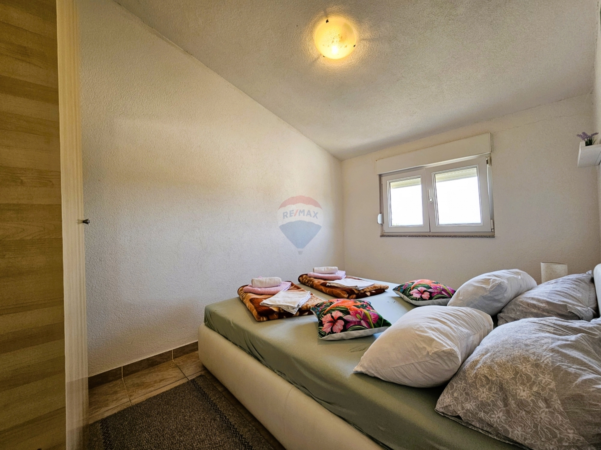 Apartmajska hiša s pogledom na morje, Rogoznica