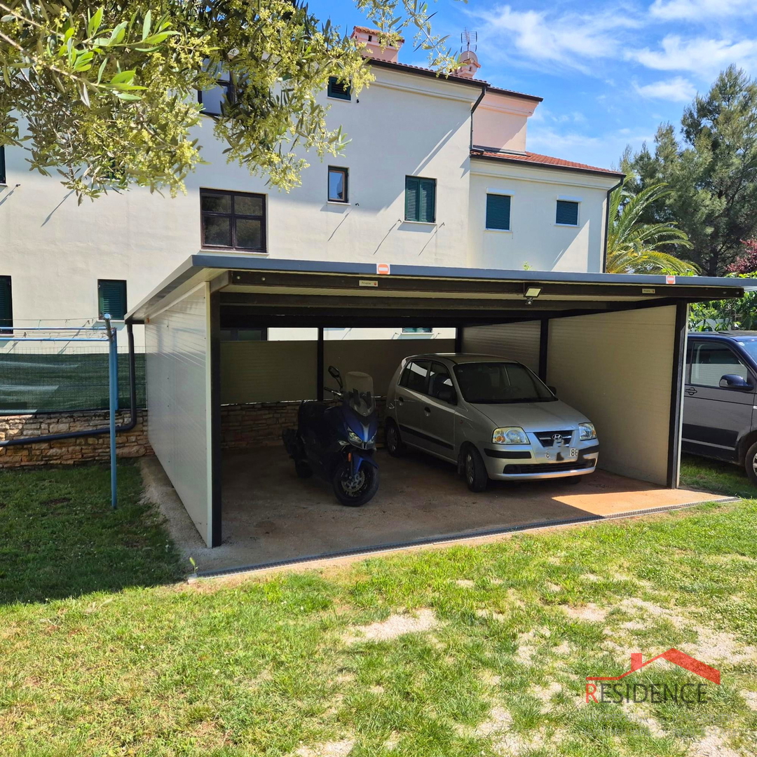 Apartma v Premanturi, pritličje, dvorišče, 3 parkirna mesta