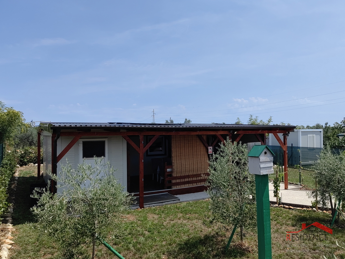 Kmetijsko zemljišče v Fažani z vikend hišo