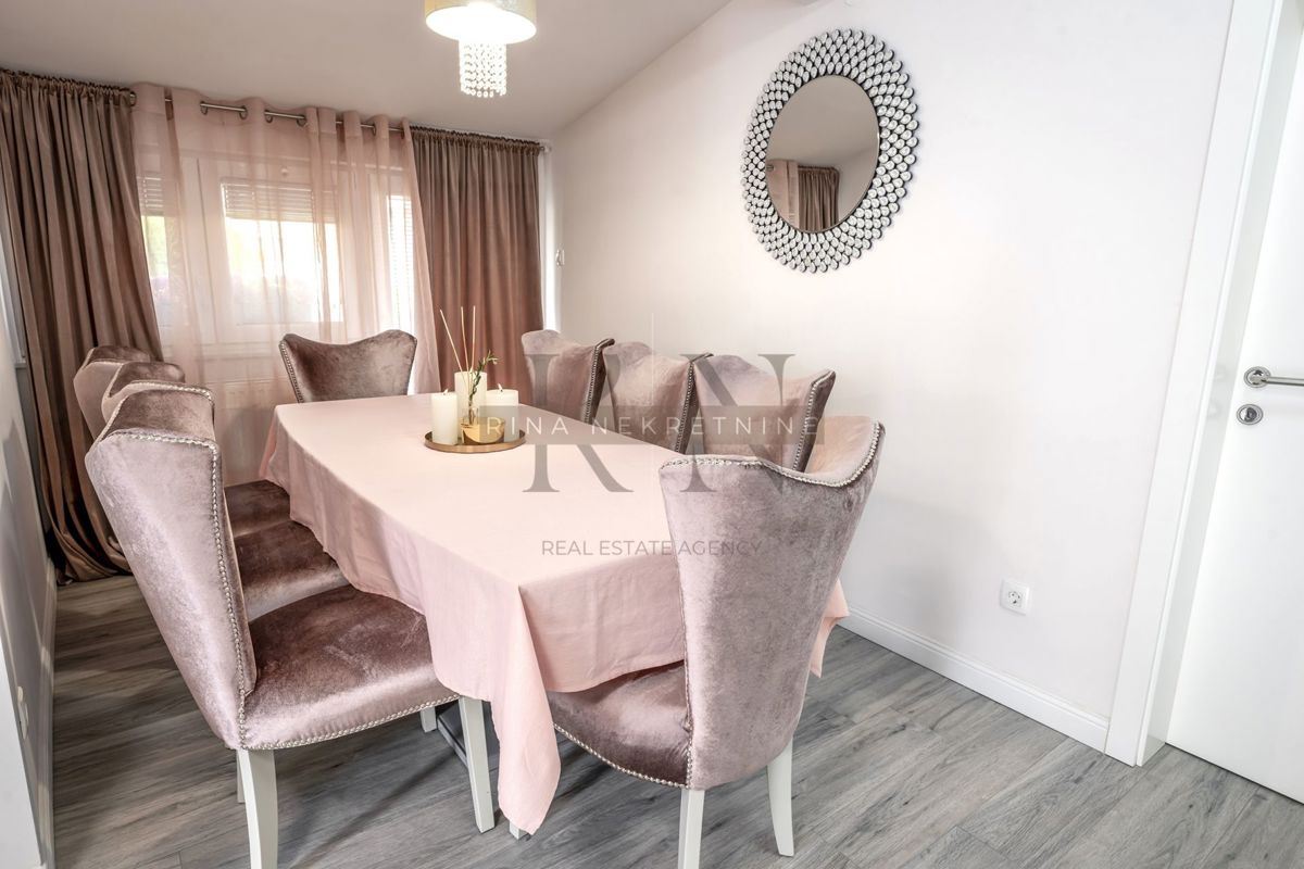 ČRNOMEREC - HIŠA Z 2 STANOVANJIMA IN POSL. PROSTOR