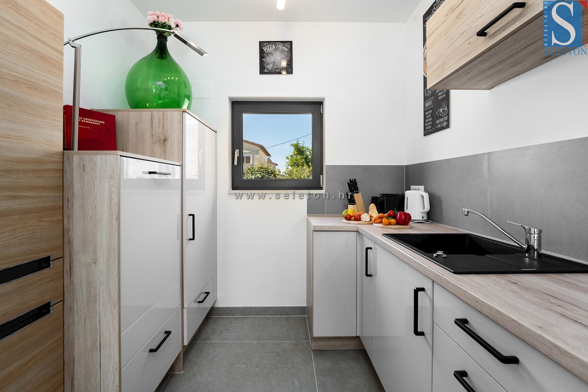 Vrstna hiša velikosti 114 m2 z bazenom