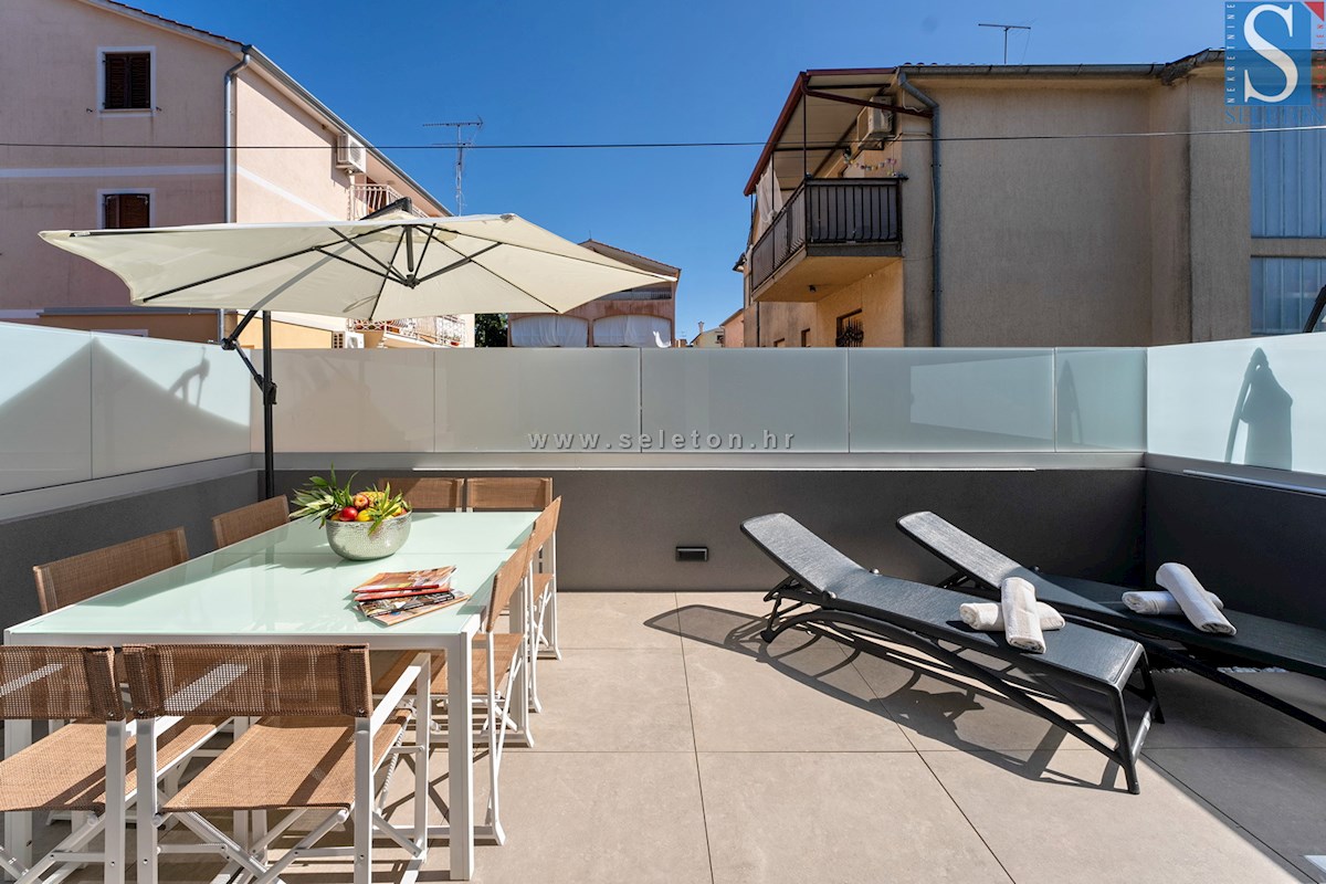 Vrstna hiša velikosti 114 m2 z bazenom