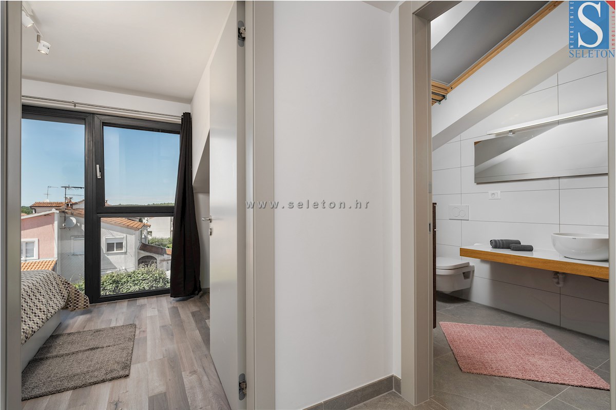 Vrstna hiša velikosti 114 m2 z bazenom