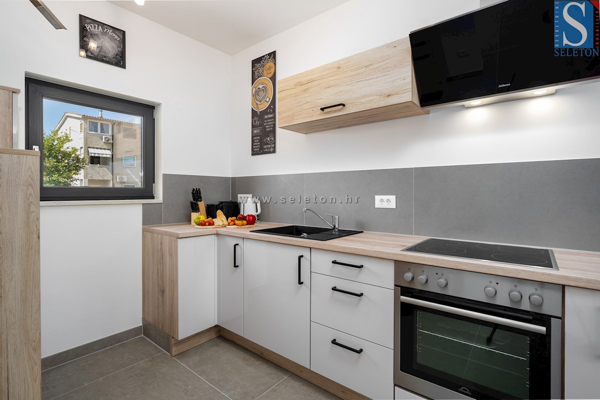 Vrstna hiša velikosti 114 m2 z bazenom