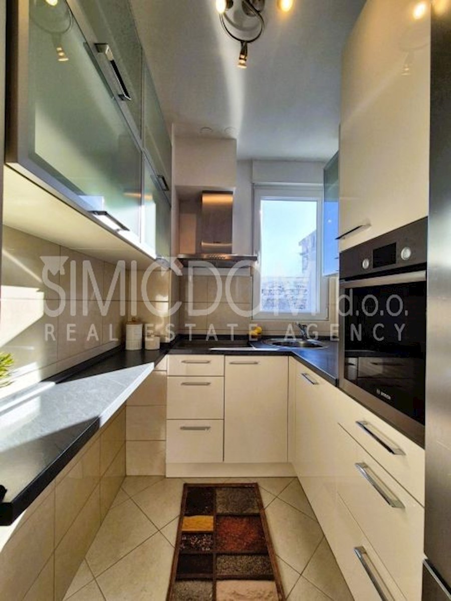 Apartma s pogledom na morje, Žnjan