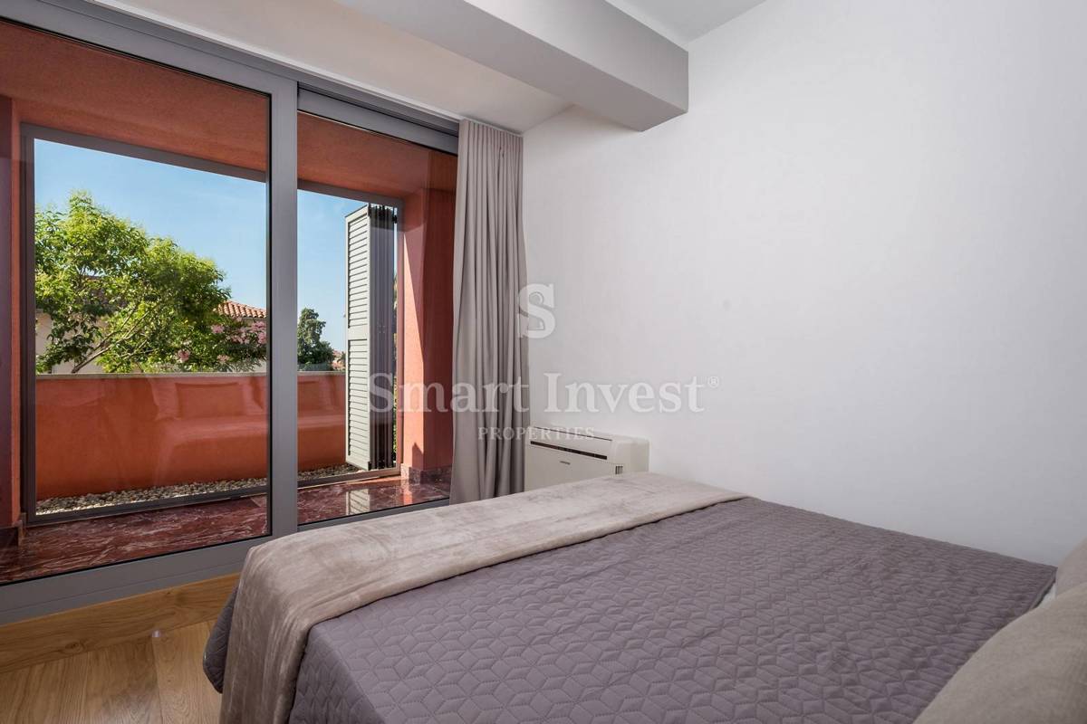 OPATIJA, exclusive apartment of 153.68 m2 with garden and garage