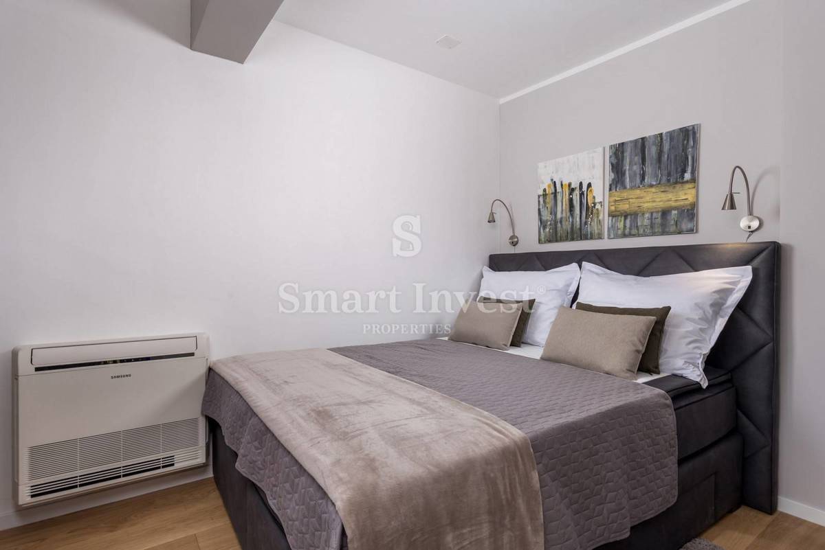 OPATIJA, exclusive apartment of 153.68 m2 with garden and garage
