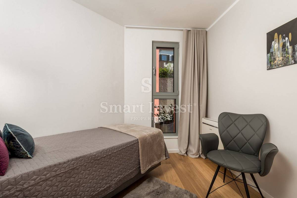 OPATIJA, exclusive apartment of 153.68 m2 with garden and garage