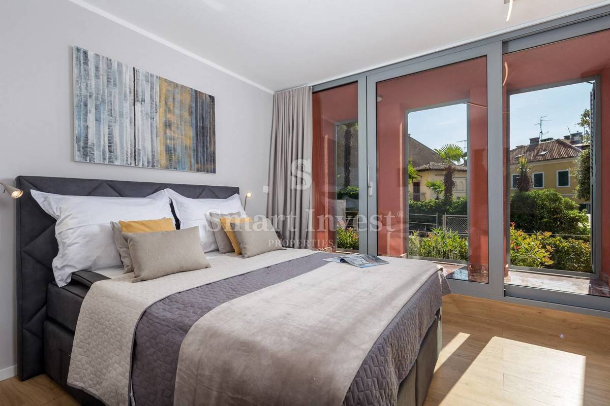 OPATIJA, exclusive apartment of 153.68 m2 with garden and garage