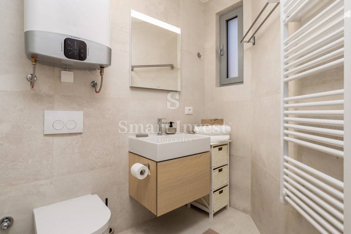 OPATIJA, exclusive apartment of 153.68 m2 with garden and garage