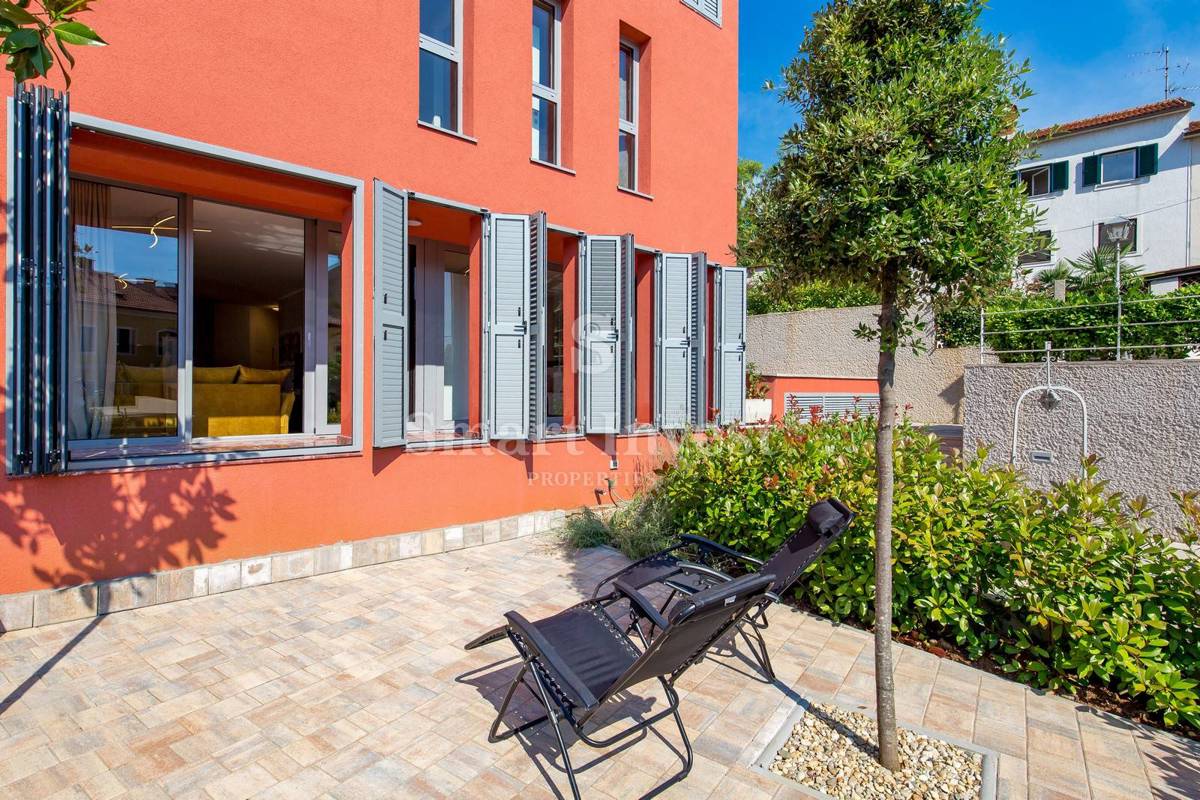 OPATIJA, exclusive apartment of 153.68 m2 with garden and garage