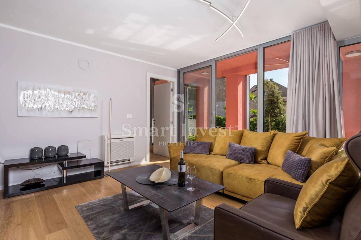 OPATIJA, exclusive apartment of 153.68 m2 with garden and garage