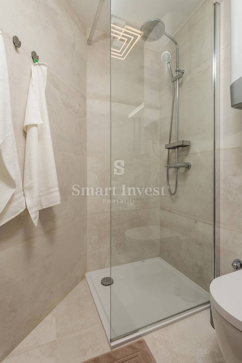 OPATIJA, exclusive apartment of 153.68 m2 with garden and garage