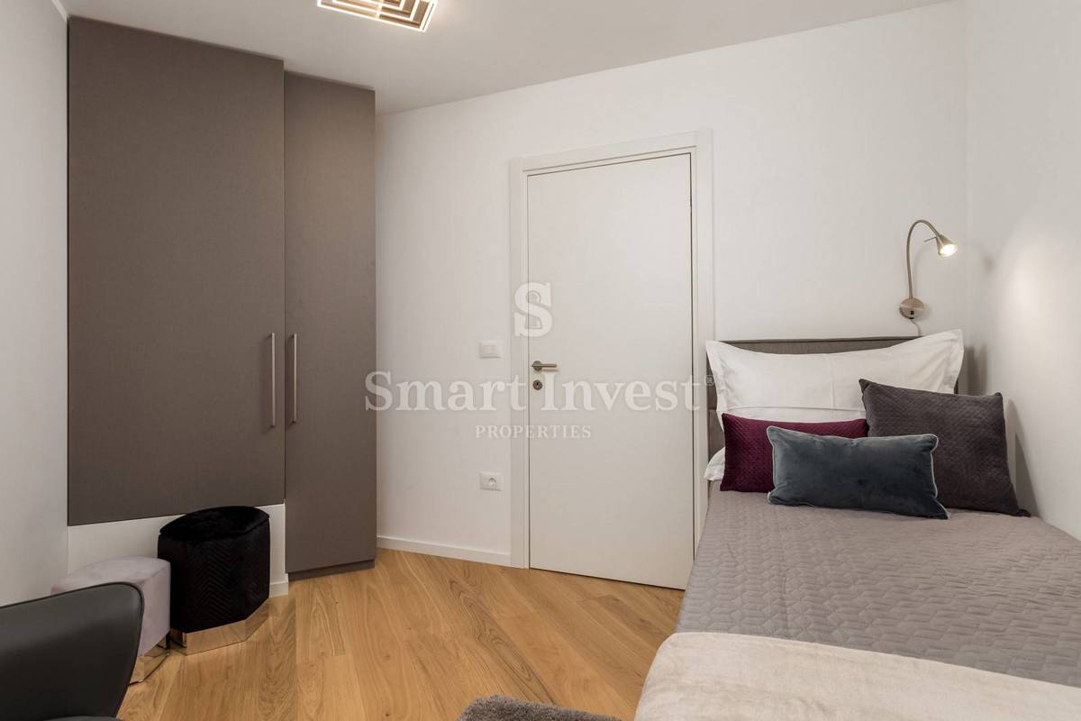 OPATIJA, exclusive apartment of 153.68 m2 with garden and garage