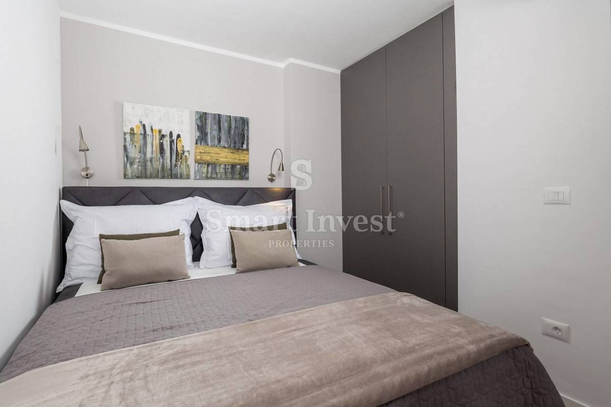 OPATIJA, exclusive apartment of 153.68 m2 with garden and garage