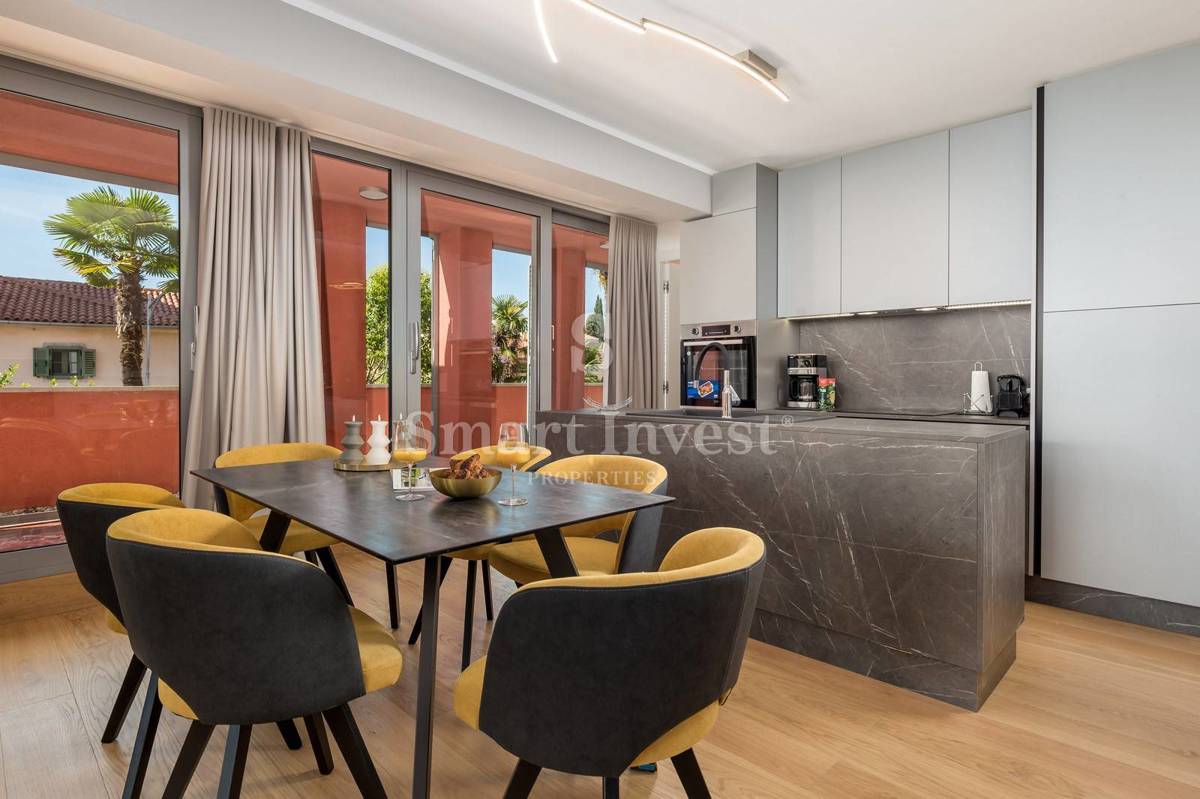 OPATIJA, exclusive apartment of 153.68 m2 with garden and garage