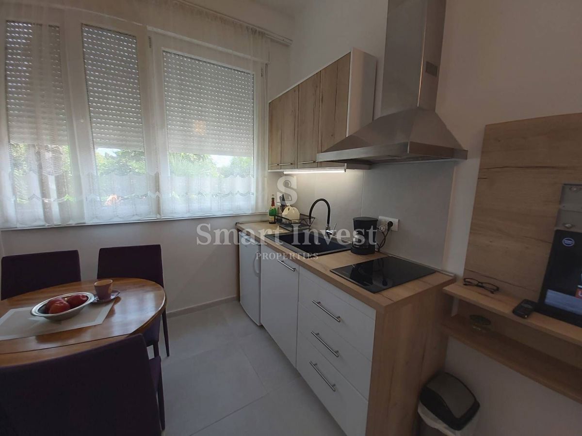 OPATIJA, Two apartments of 60 m2 in total, with terrace and small garden