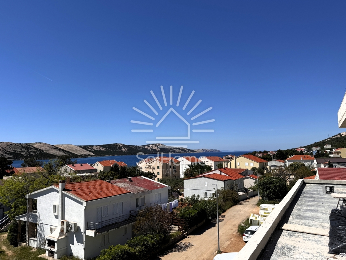 Penthouse apartmaji ob morju v Novalji