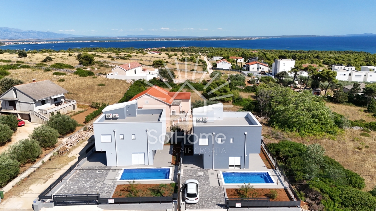 Hiše s panoramskim pogledom na morje in strešno teraso v Viru / Hrvaška
