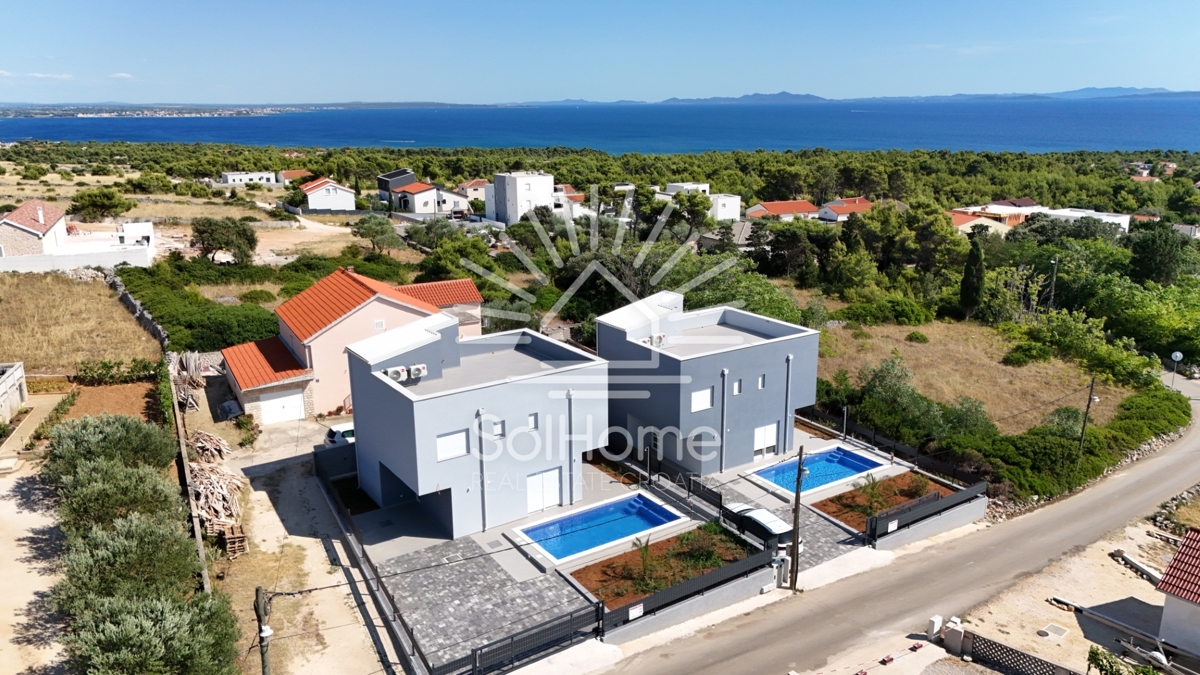 Hiše s panoramskim pogledom na morje in strešno teraso v Viru / Hrvaška