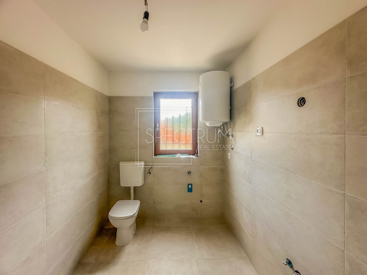 Okolica Buja, adaptirano stanovanje v pritličju z vrtom