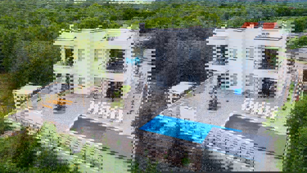 Krk, okolica, moderna vila z 4 stanovanjskimi enotami in čudovitim pogledom na morje