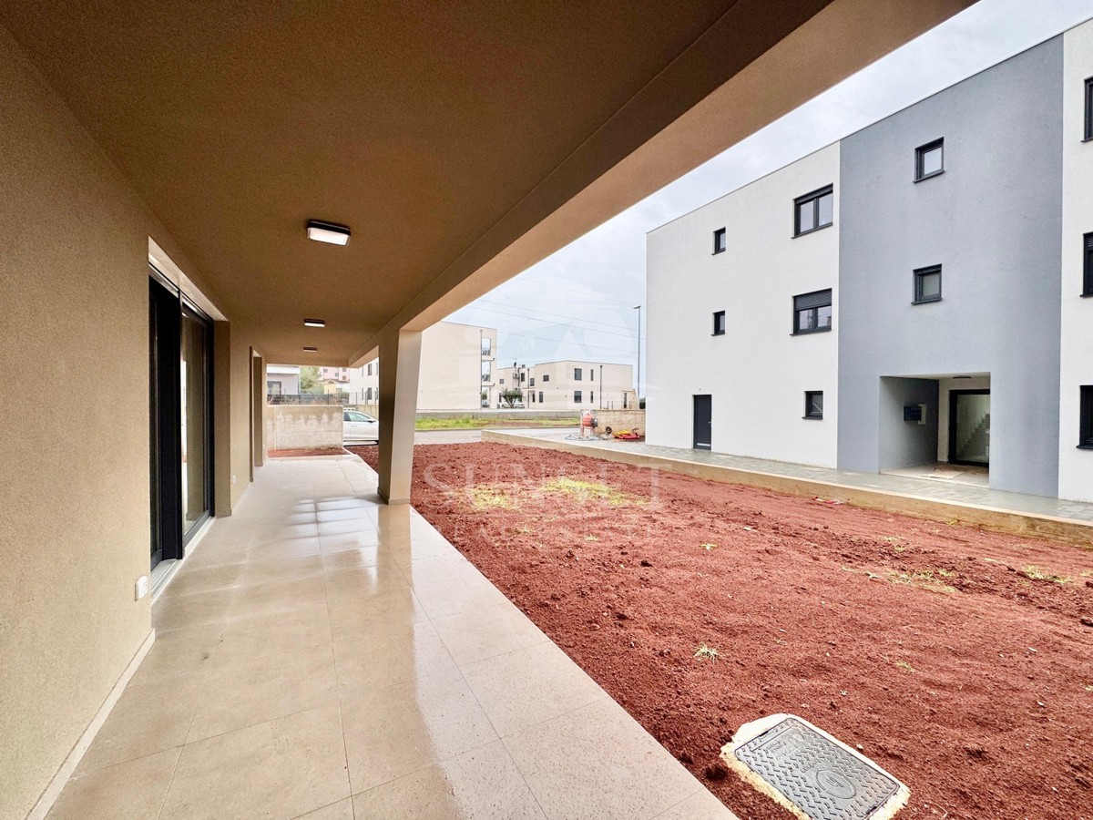 MODERNO DVOSOBNO STANOVANJE Z VRTOM IN TERASO V OKOLICI UMAGA