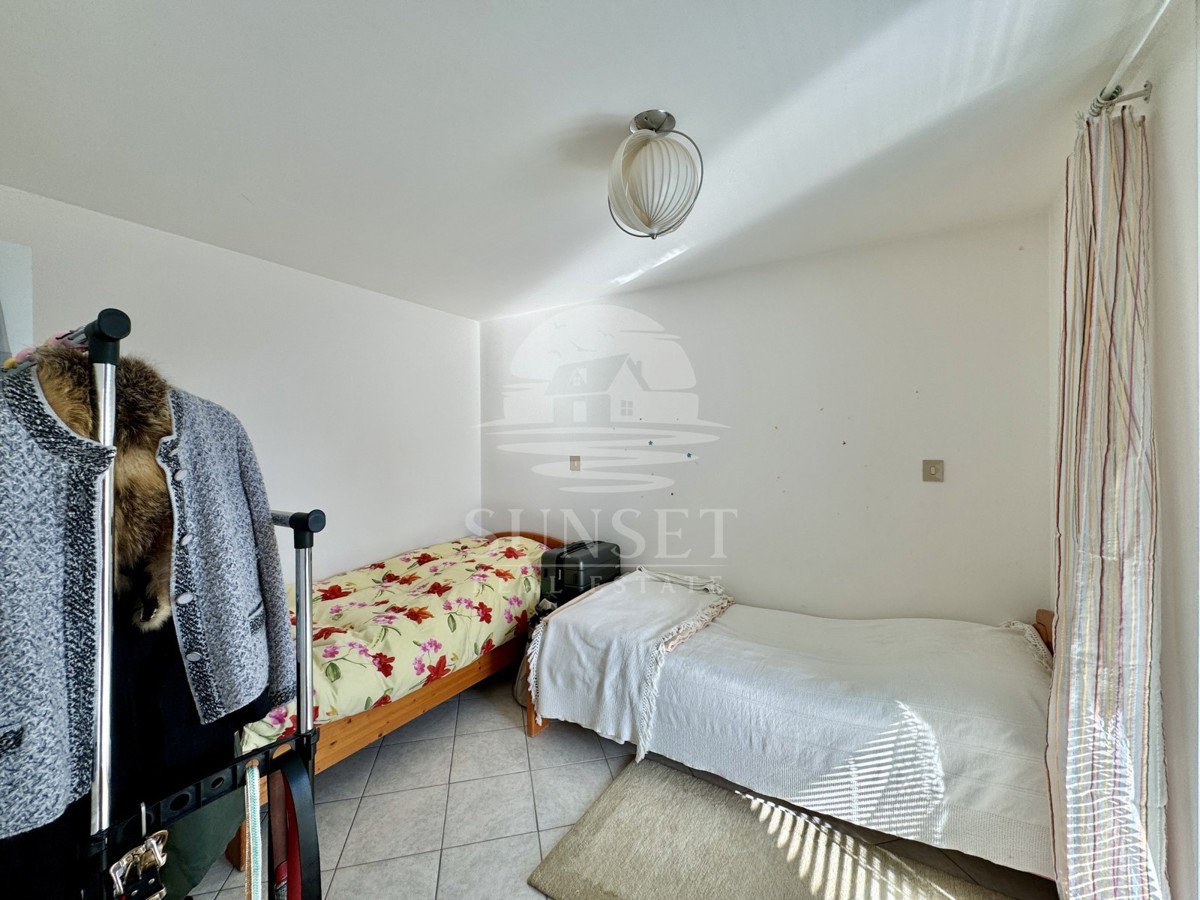 UMAG – STAN Z RAZGLEDOM NA MORJE IN GARAŽO 20 M²