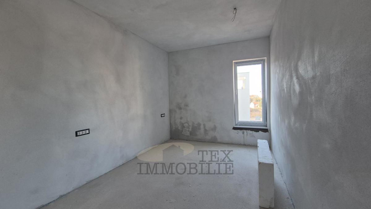 Stanovanje z vrtom in tremi spalnicami - B