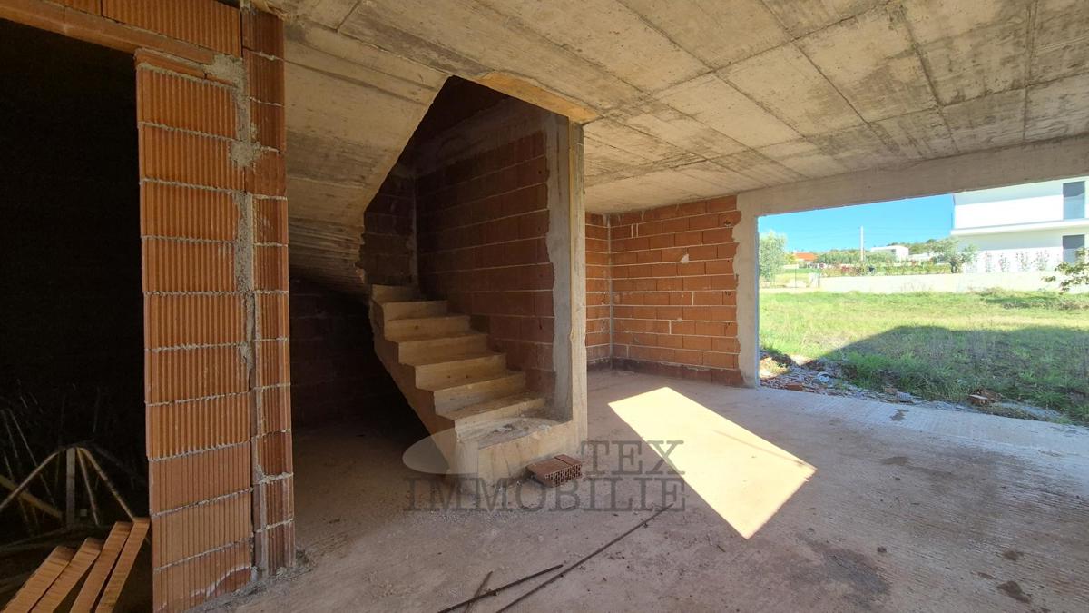 Hiše v fazi surove gradnje v ekskluzivnem stanovanjskem projektu