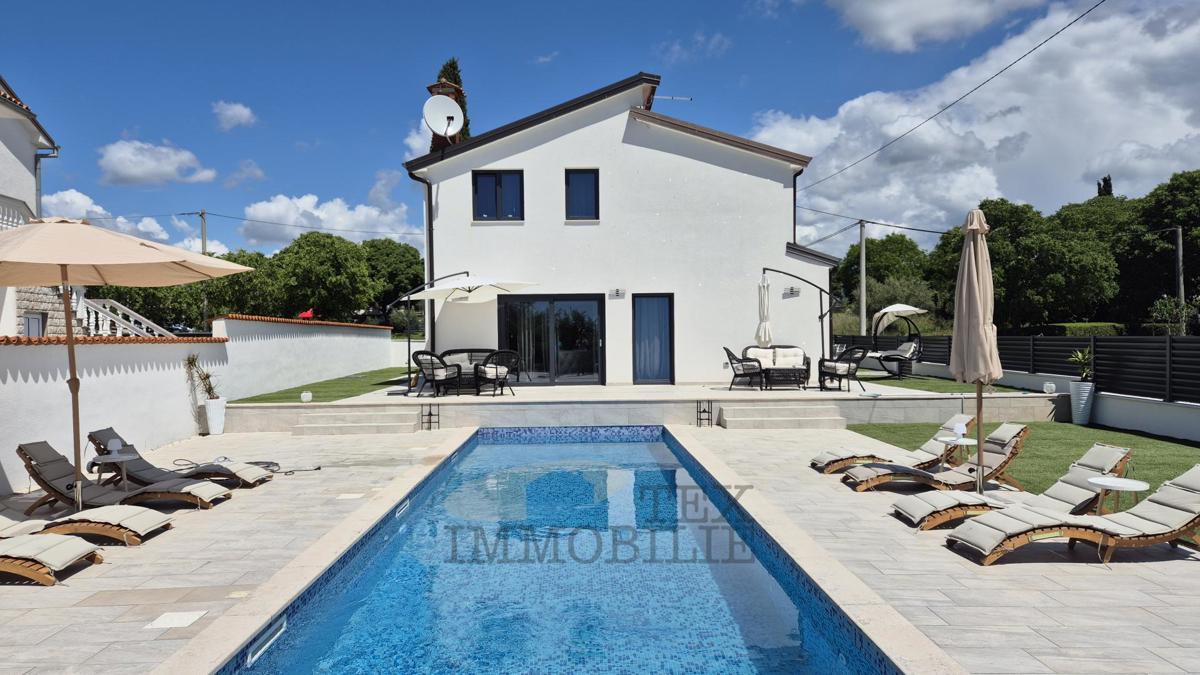 Hiša z dvema apartmajema le 4 km od Poreča