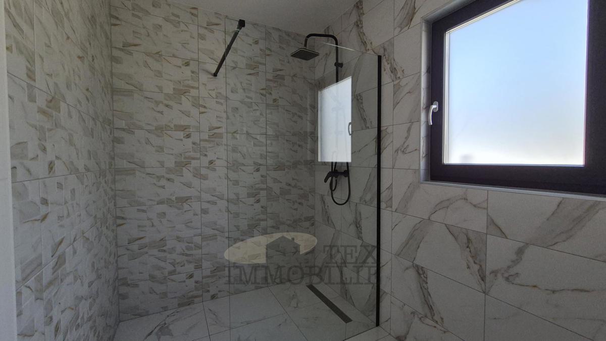 Hiša z dvema apartmajema le 4 km od Poreča