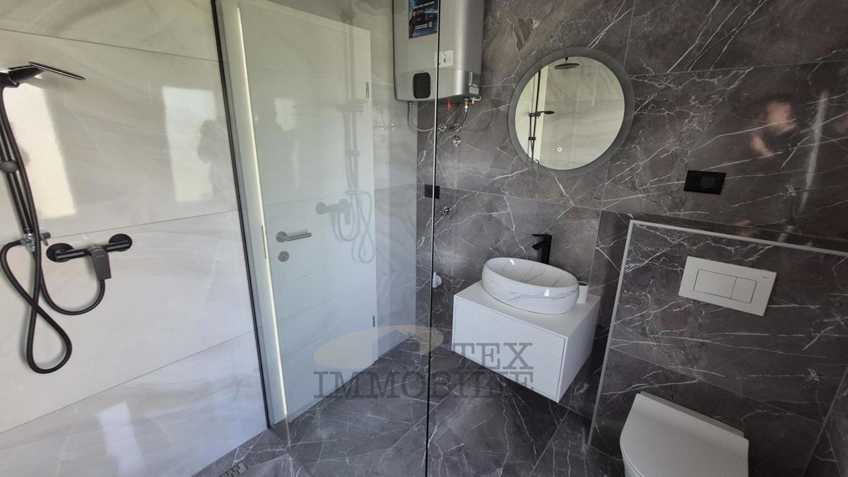 Hiša z dvema apartmajema le 4 km od Poreča