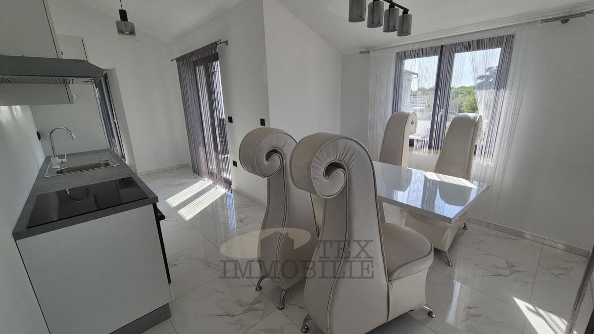 Hiša z dvema apartmajema le 4 km od Poreča