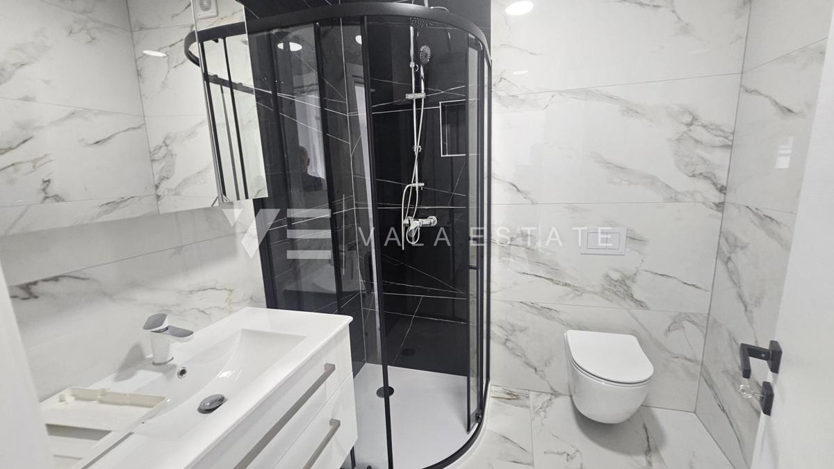DVOSOBNI APARTMA NA MIRNI LOKACIJI S POGLEDOM NA MORJE