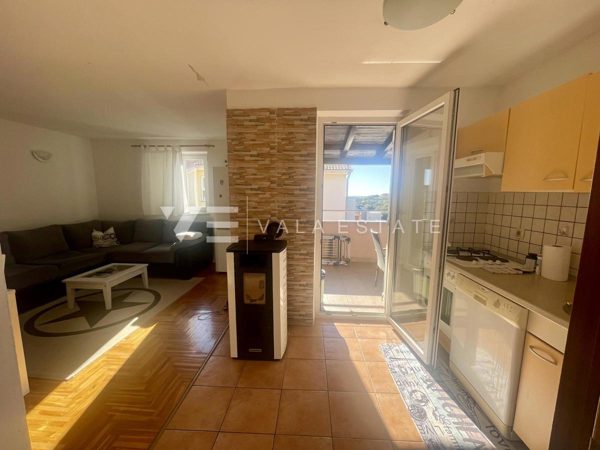 DVOSOBNI APARTMA NA MIRNI LOKACIJI