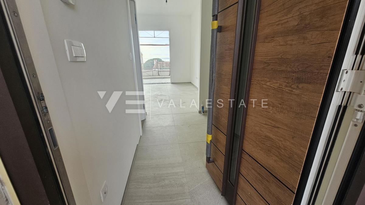 DVONADSTROPNI APARTMA V NOVI STAVBI S POGLEDOM NA MORJE