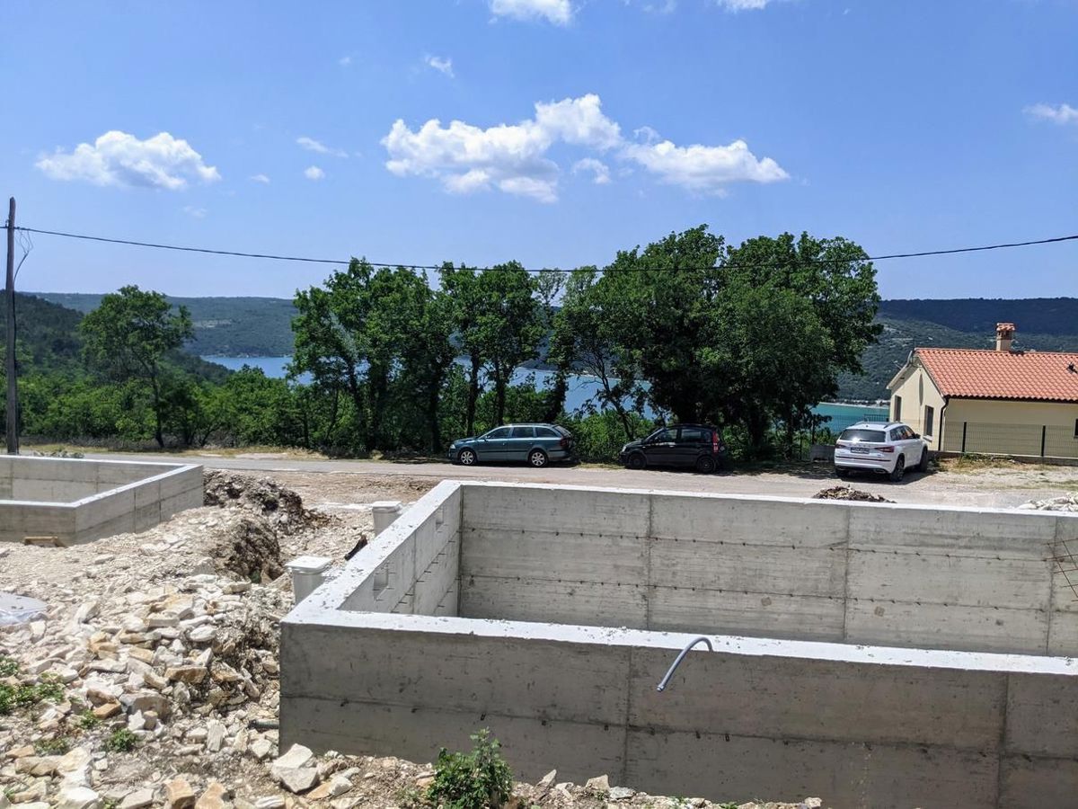 Labin, kamnita hiša s pogledom na morje in bazenom