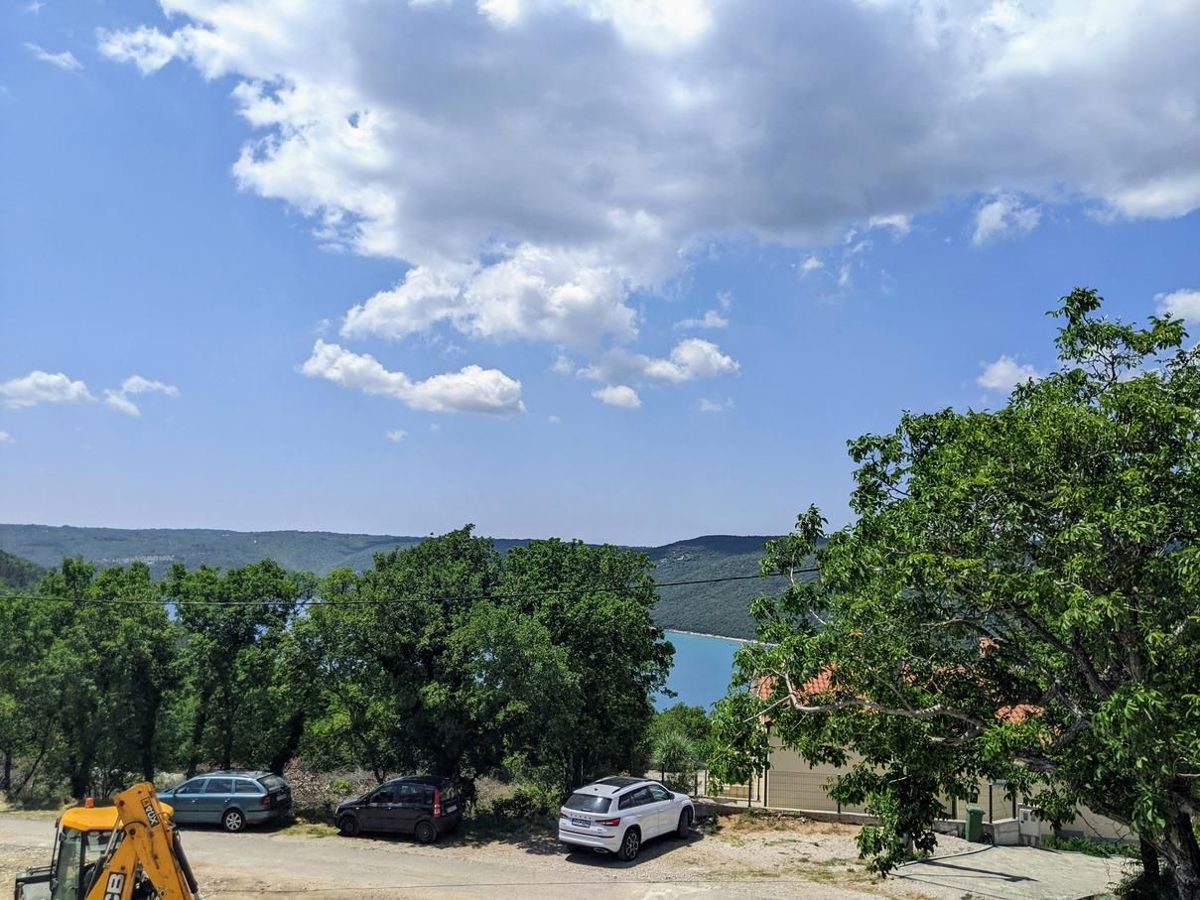 Labin, kamnita hiša s pogledom na morje in bazenom